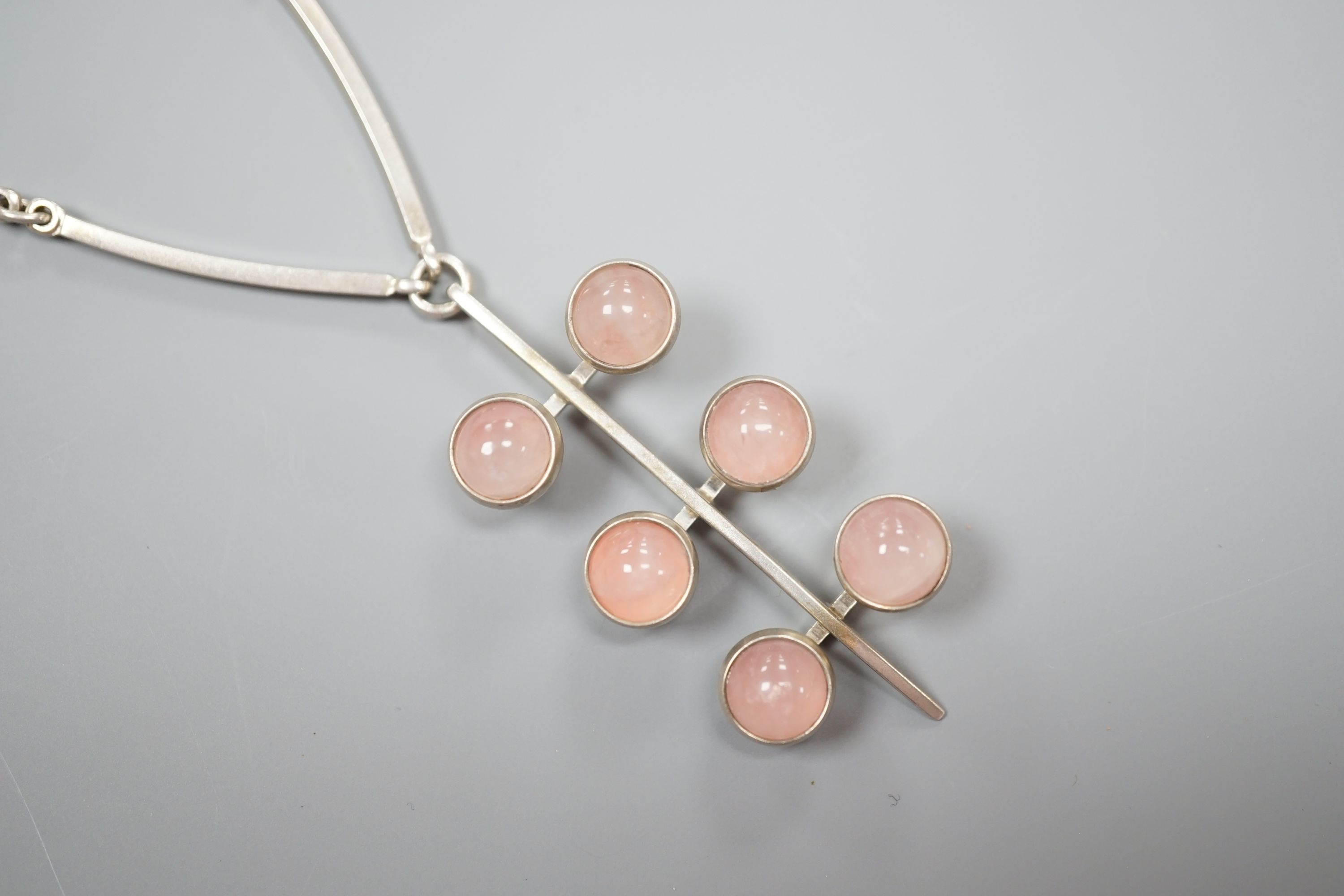 A stylish Danish 925 and rose quartz set necklace, by Niels From, stamped '925 From', 56cm.